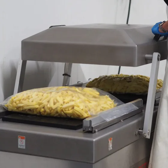 Fresh chips in the vacuum packing machine
